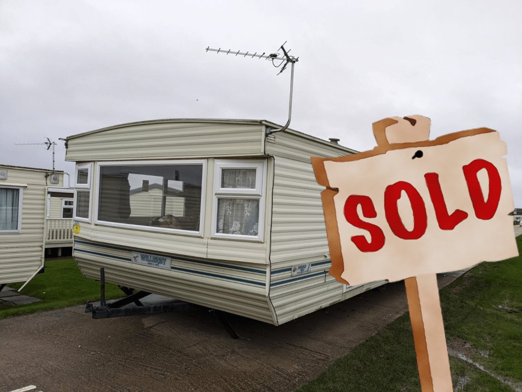 A Willerby Herald static caravan on its pitch, with the original website's SOLD sign